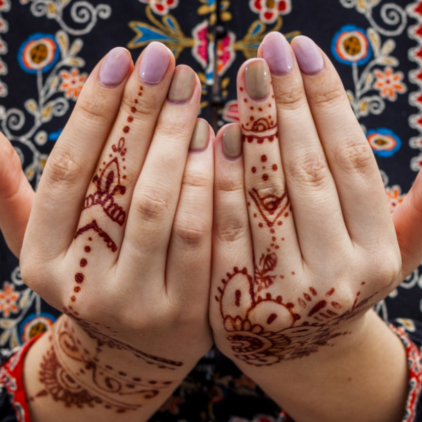 female-hands-painted-with-mehndi